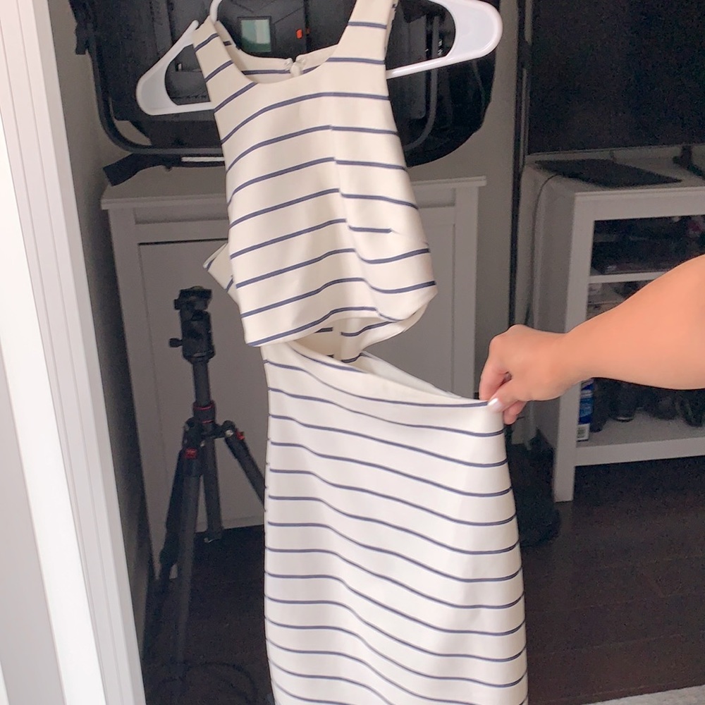 White dress with blue horizontal stripes
